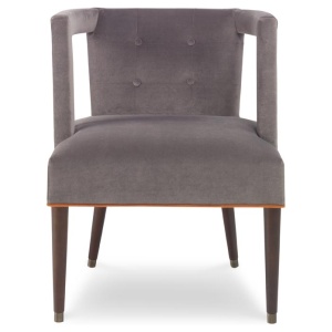 The Eliza Chair shown in Anchovy Velvet sits in a studio.