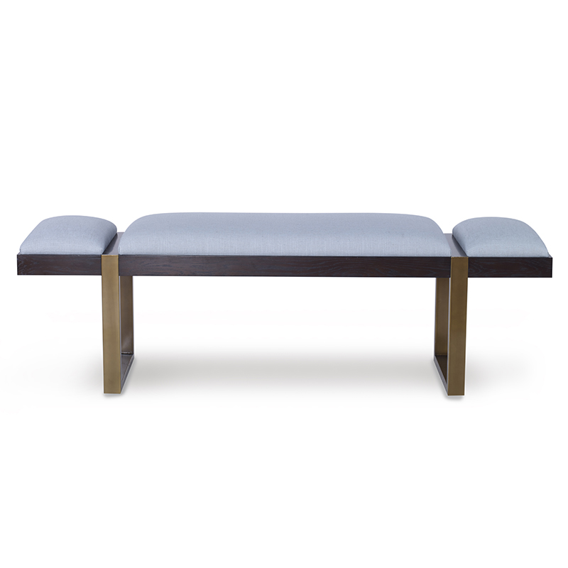 The Mercer Bench in Glacier Linen and Dark Oak sits in a studio.