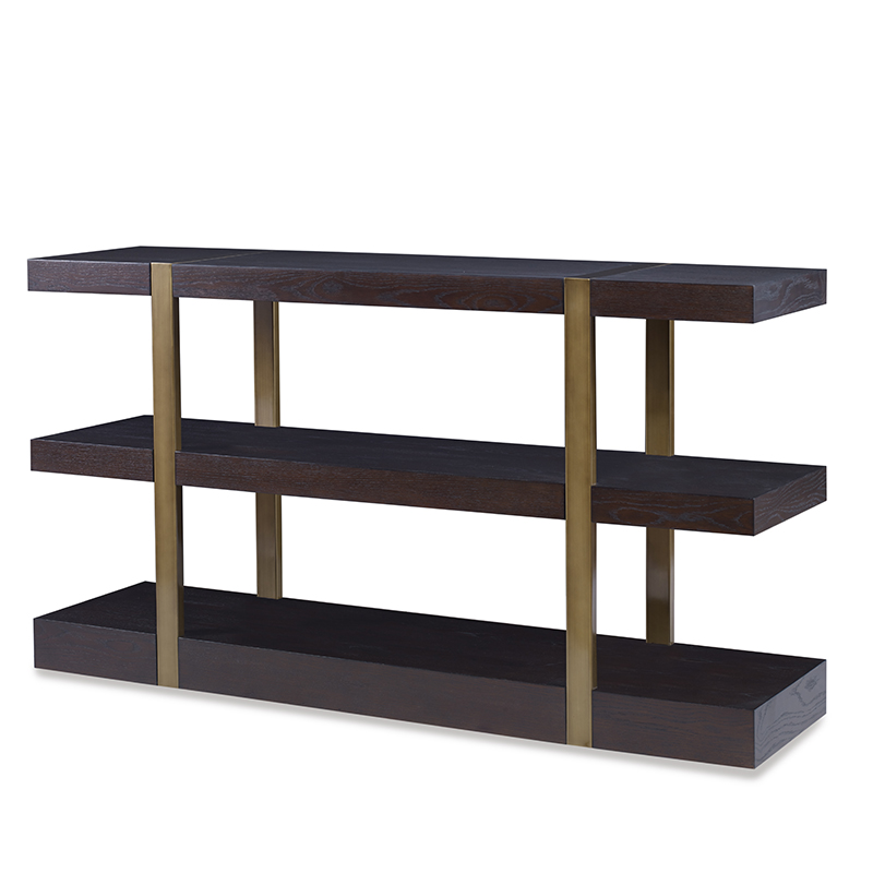 The Mercer Console in Warm Dark Oak with Finished Aged Brass sits in a studio.