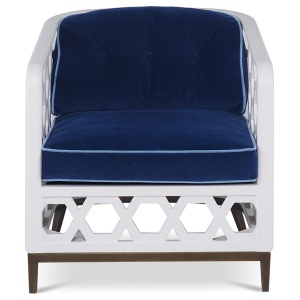 The Wilhelm Chair in Santorini White and Lapis Blue Velvet sits in a studio