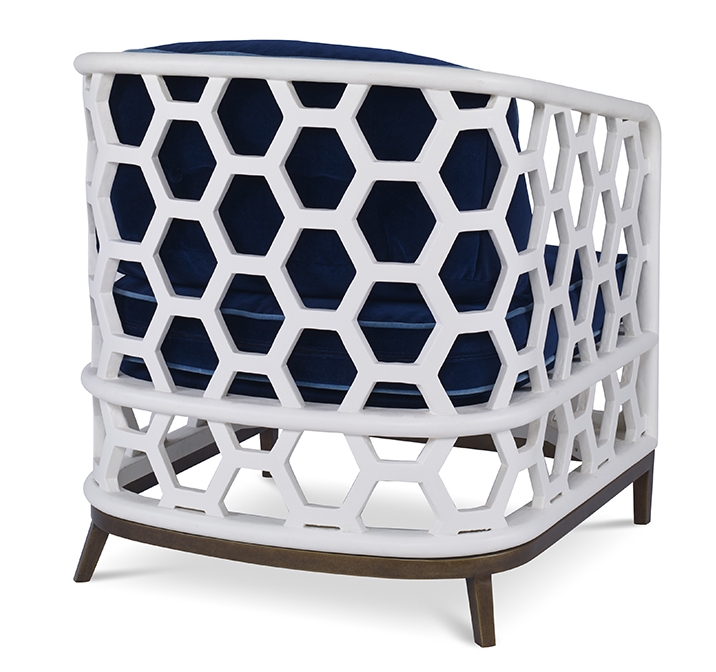 The Wilhelm Chair in Santorini White and Lapis Blue Velvet sits in a studio