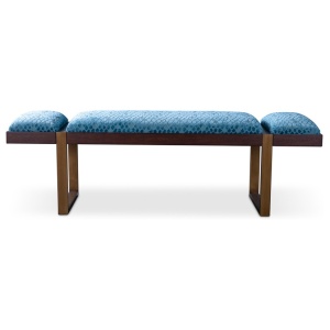 The Mercer Bench in COM and Dark Oak sits in a studio.
