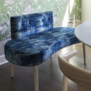 Add character to a small space with a bold velvet loveseat.